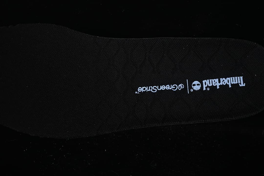 Close-up of the black insole with Timberland and Greenstride branding.