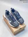 Pair of gray Nike Wildhorse 10 trail shoes with white accents on a Nike Trail box