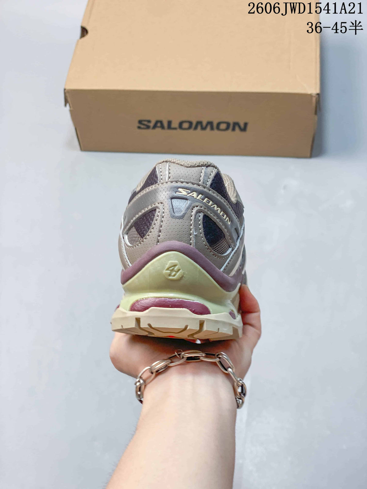 Rear view of the shoe showing the heel and layered accents