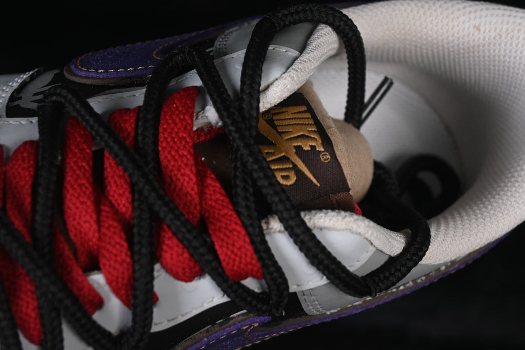 Close-up of the red and black laces and tongue label