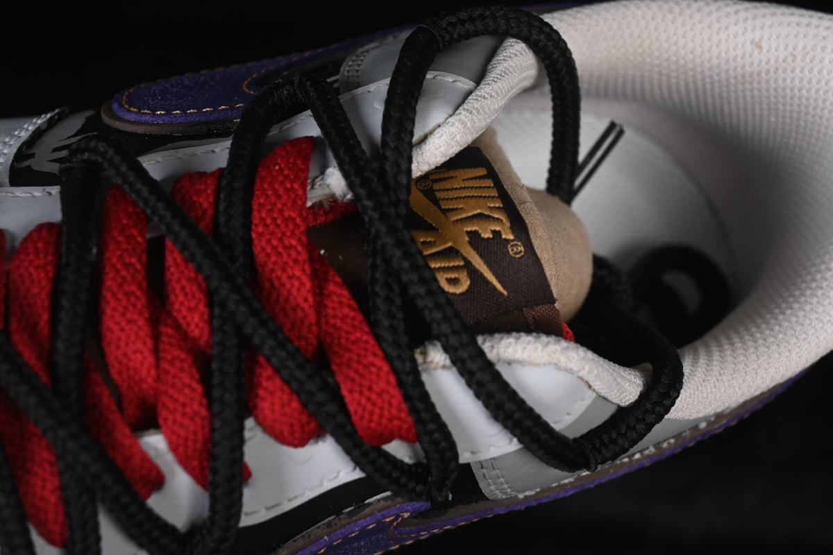 Close-up of the red and black laces and tongue label