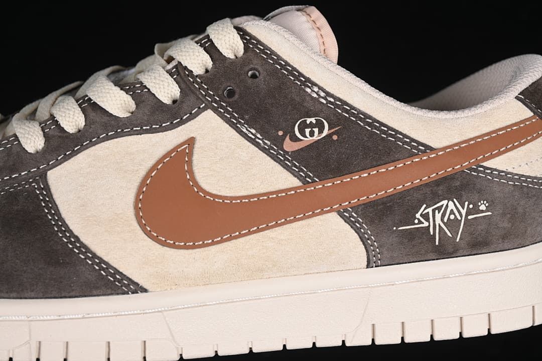 Close-up of the side overlays, brown Swoosh, stitching, and graphic details.