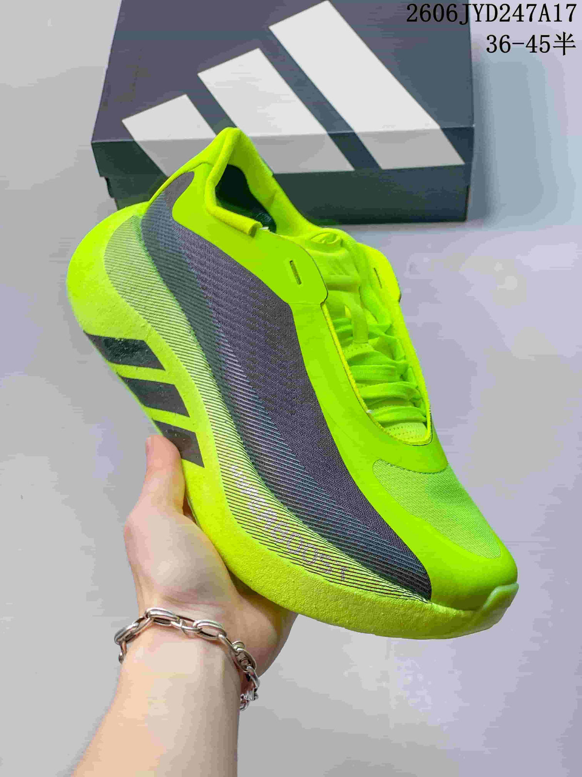 Angled side view of the neon yellow and gray sneaker