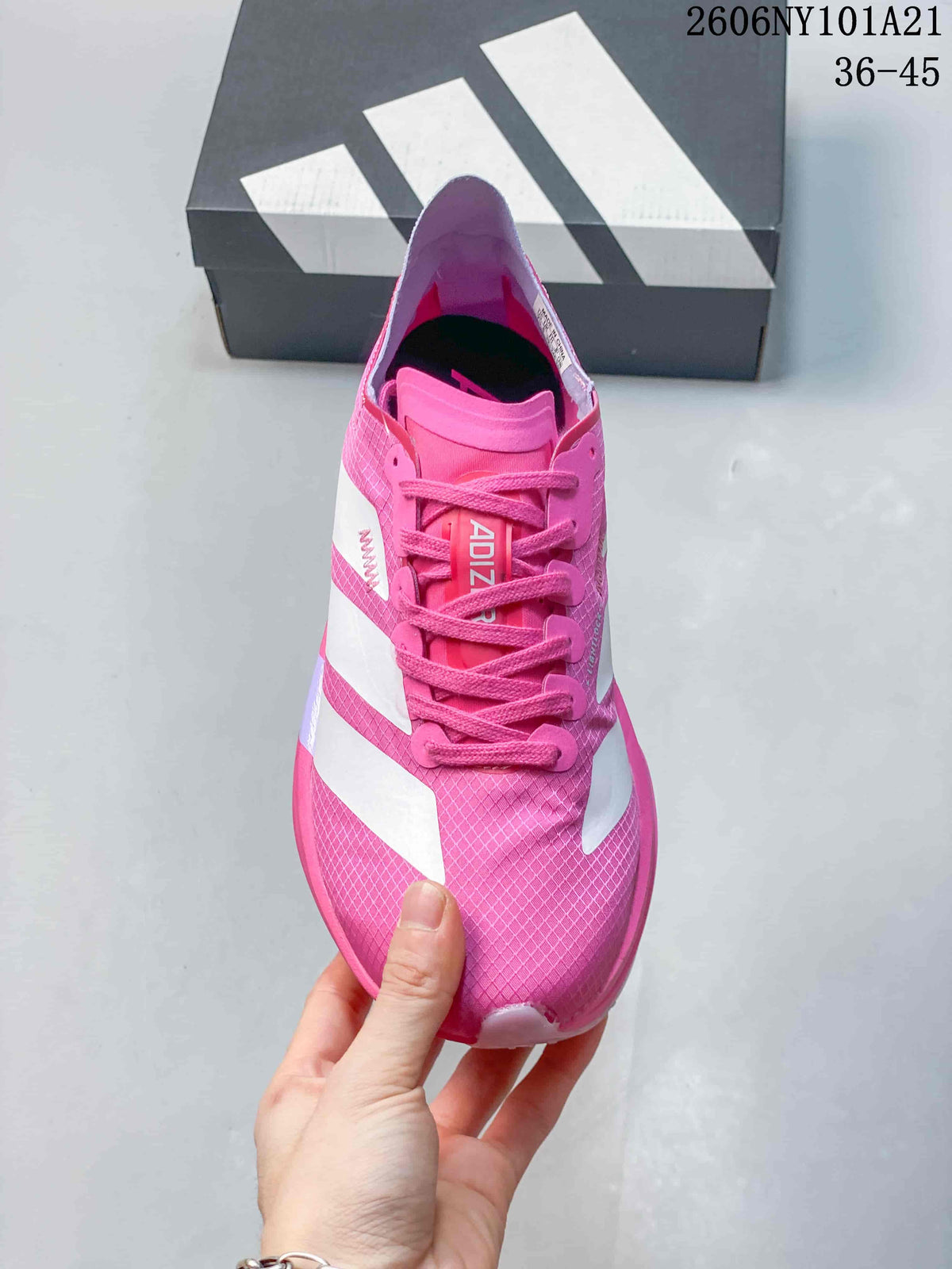 Front view of the pink lace-up shoe with white stripes