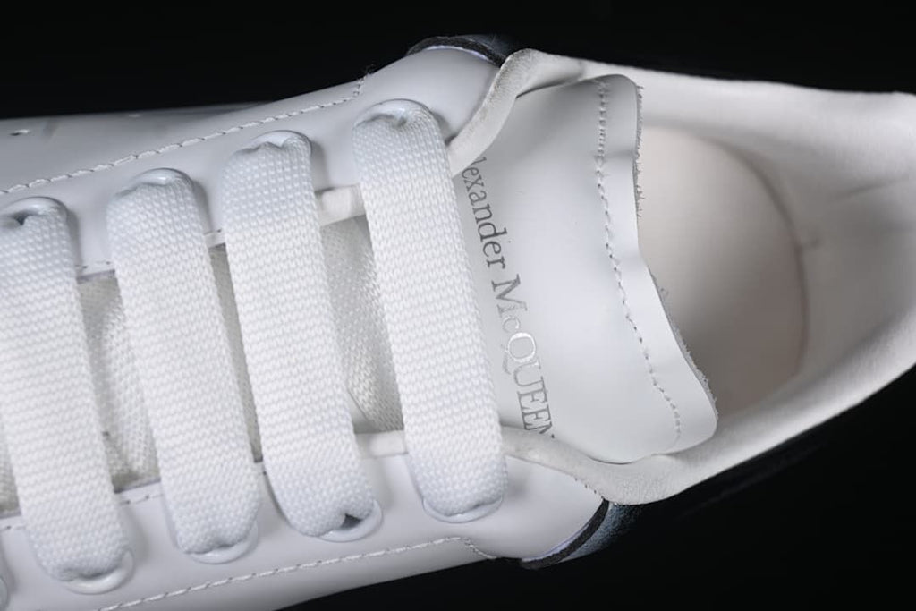 Top view of the tongue and wide white laces