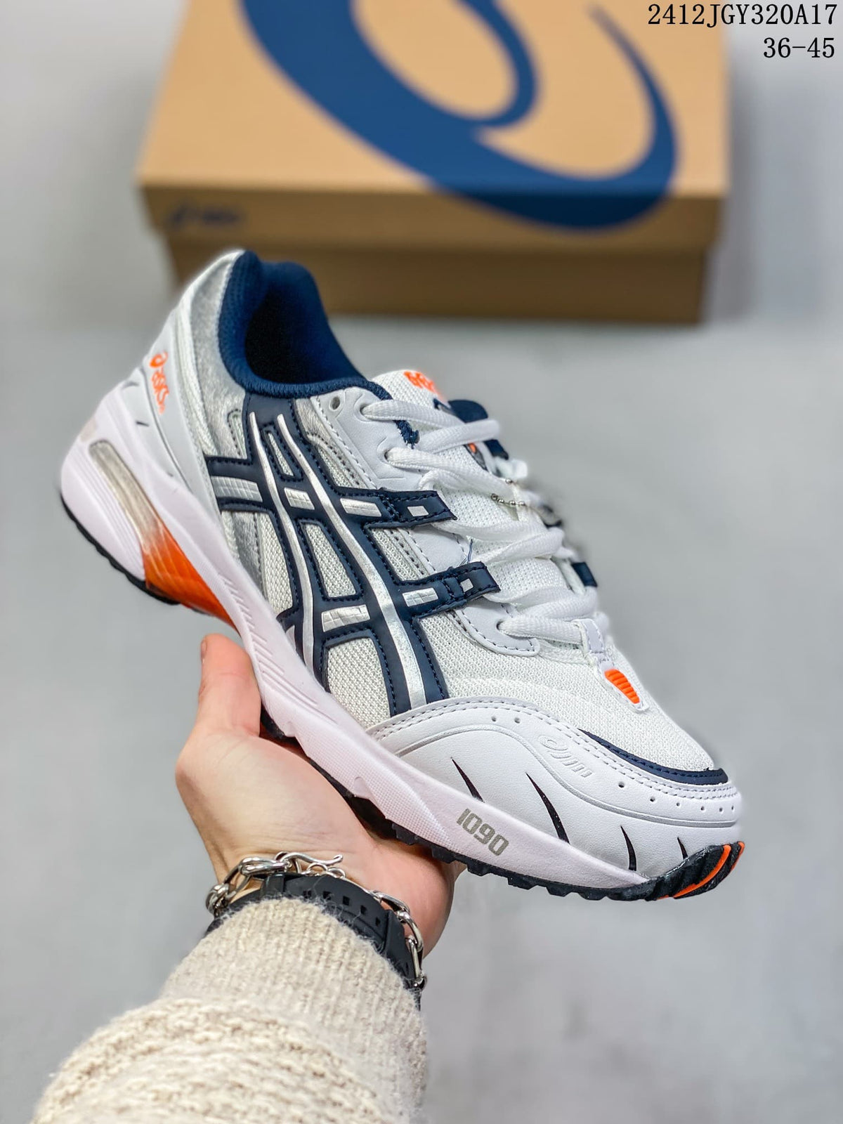 Close side view of the white ASICS GEL-1090 sneaker showing its mesh-look upper and layered overlays