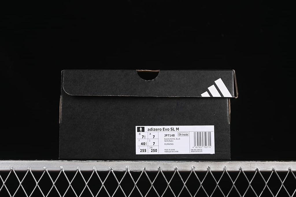 Shoe box label showing Adizero Evo SL M, JP7148, and sample size details.