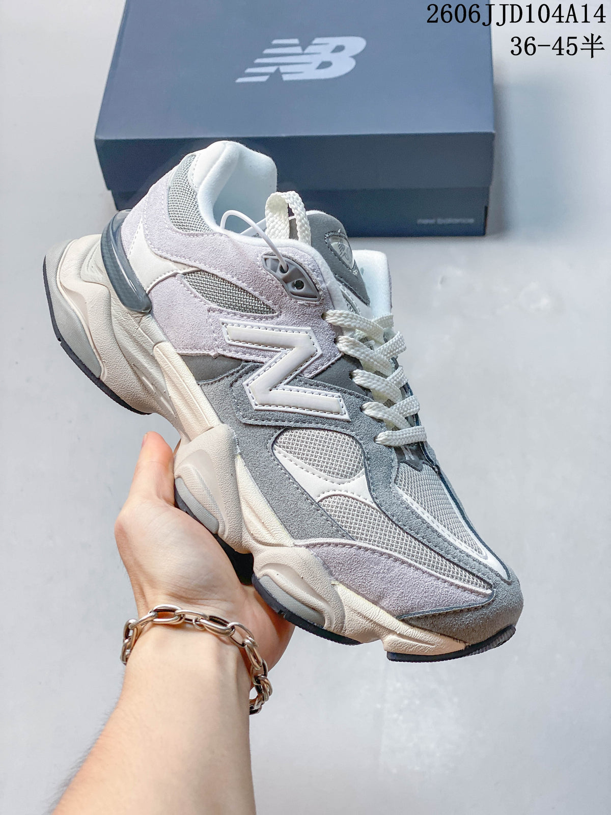 Angled side view of the New Balance 9060 sneaker with layered panels