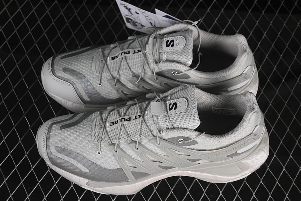 Pair of light grey Salomon XT Pu.re Advanced shoes viewed from above
