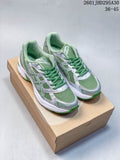 Pair of green and silver ASICS GEL-NIMBUS 10.1 sneakers on a shoebox; image text shows size range 36–45.