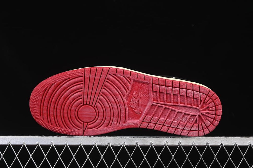 Underside view showing the red outsole tread