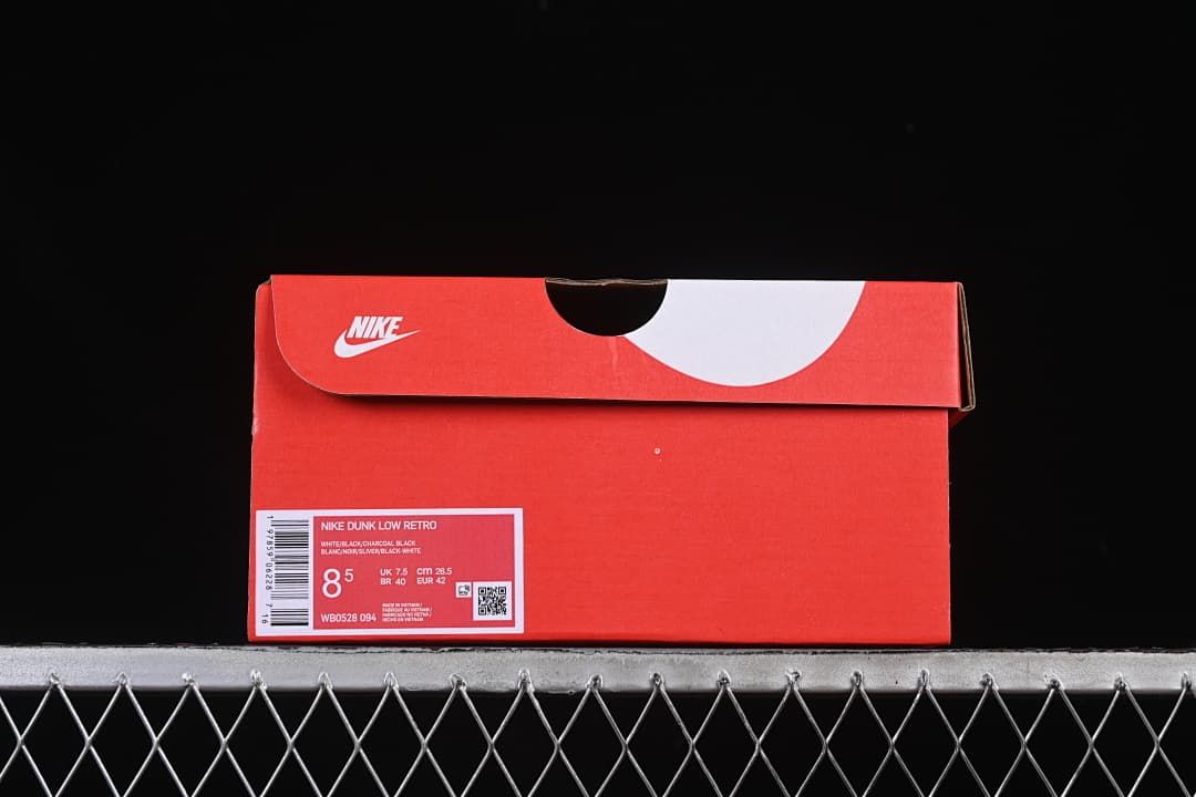 Shoe box label identifying the photographed sample as Nike Dunk Low Retro