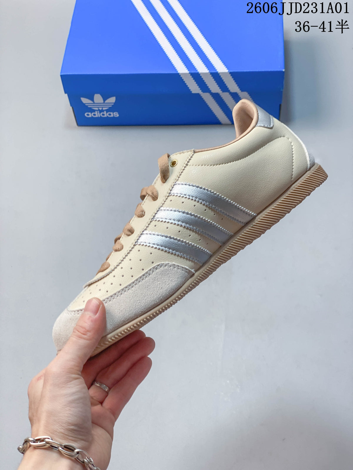 Side profile of a cream Adidas Originals Changle sneaker with silver stripes and tan laces