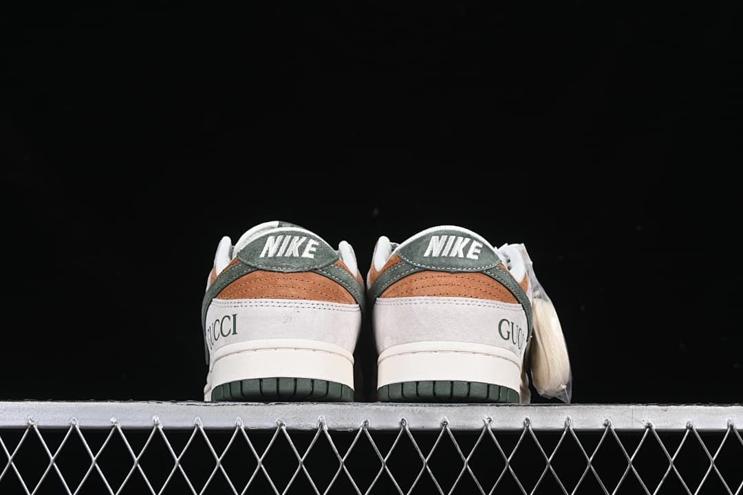Rear view of both sneakers showing heel branding and green outsoles
