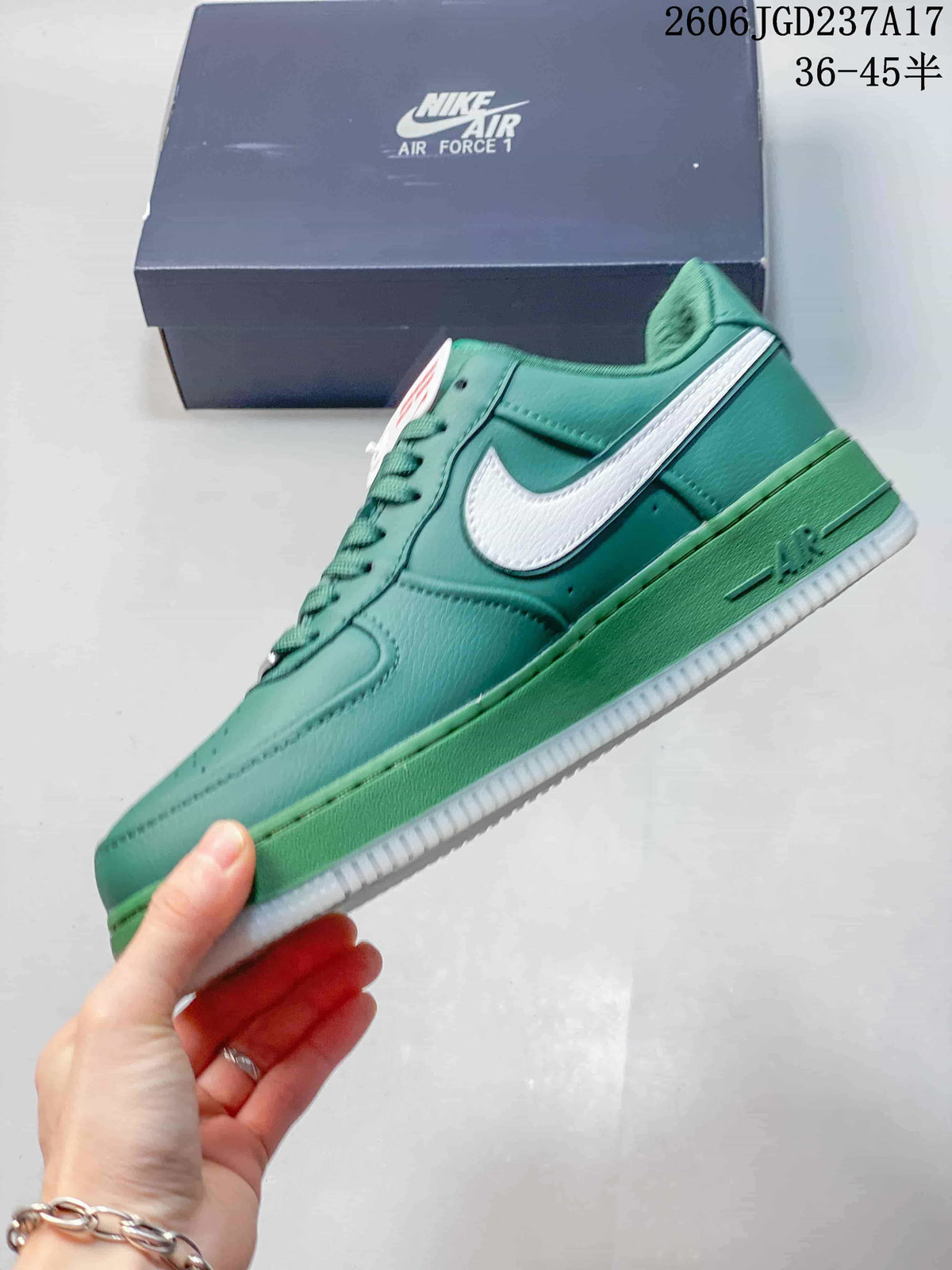 Side view of a teal low-top sneaker with a white Swoosh and green midsole.