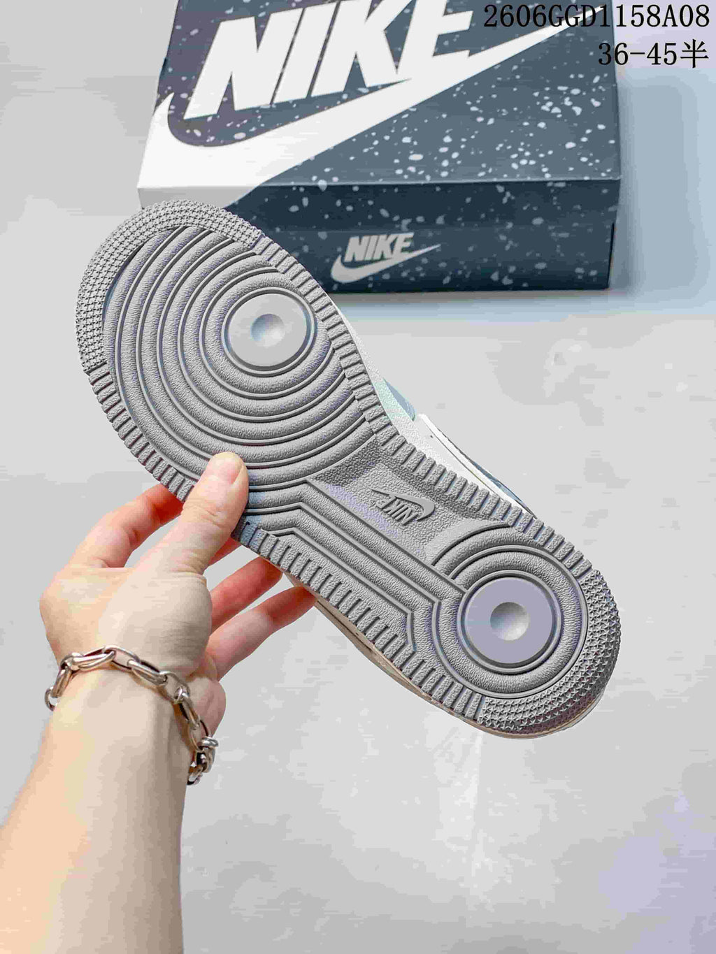 Close-up of the sneaker's gray patterned outsole