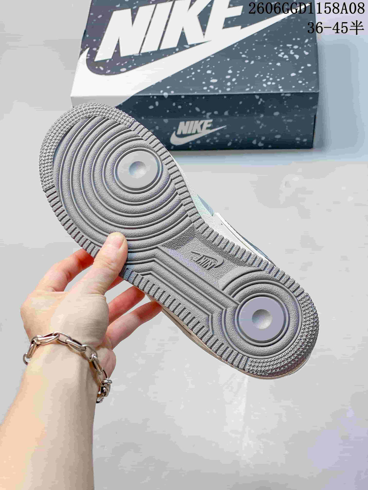 Close-up of the sneaker's gray patterned outsole