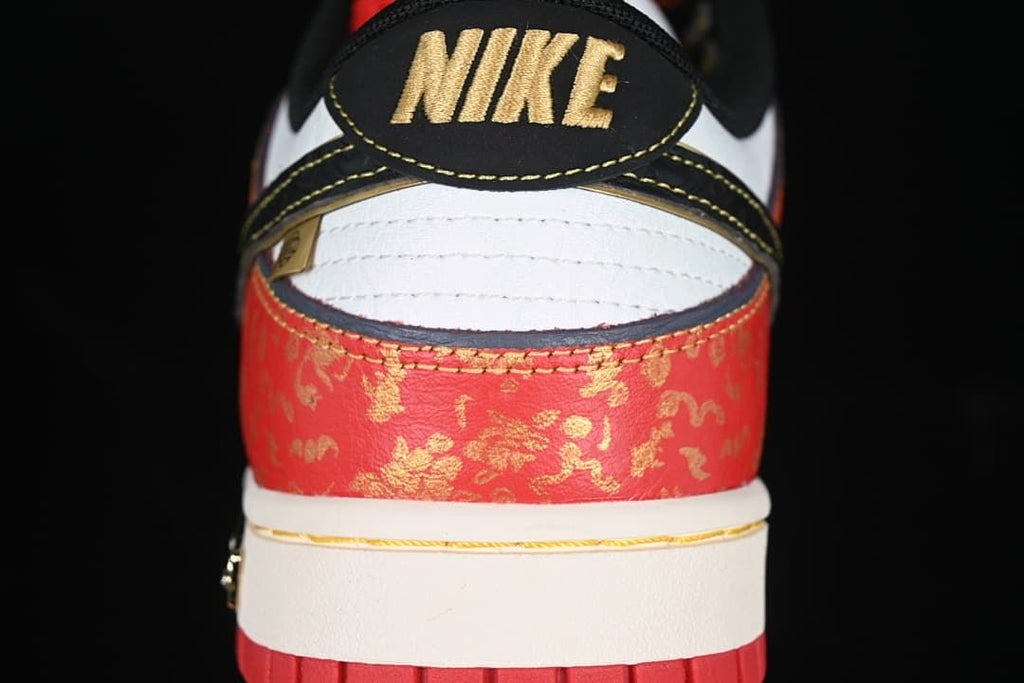 Rear view showing the patterned red heel panel and embroidered heel tab