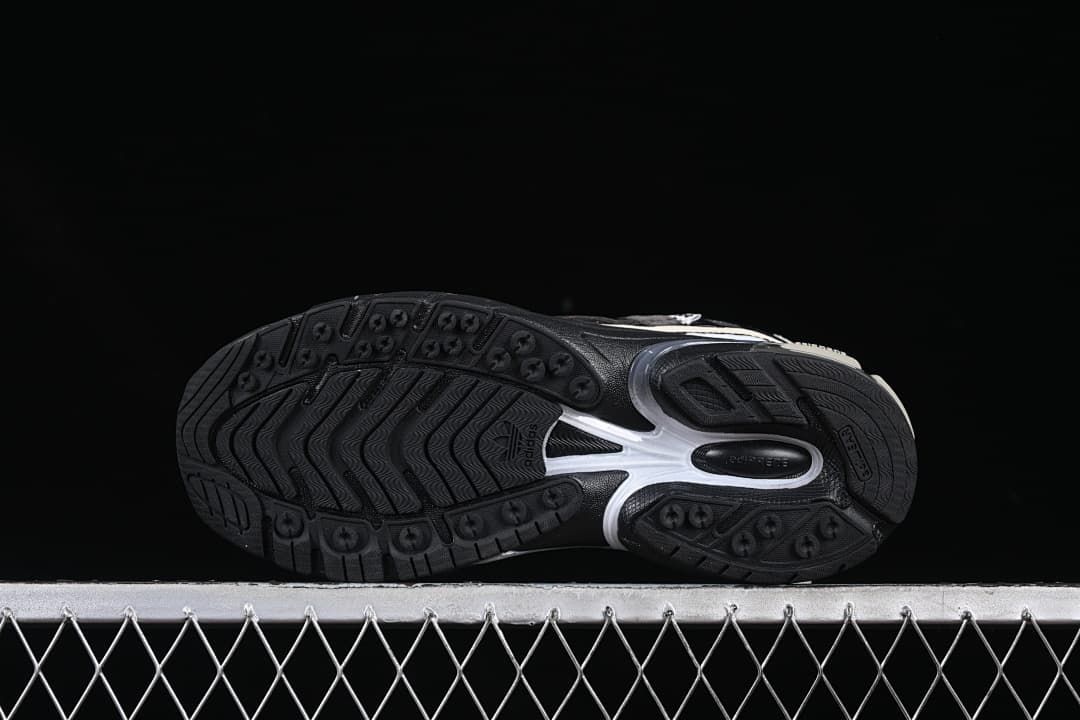 Underside view showing the patterned black outsole.