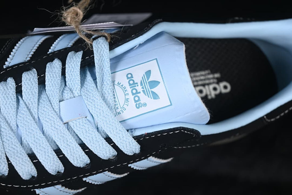 Close-up of the light blue laces and tongue label