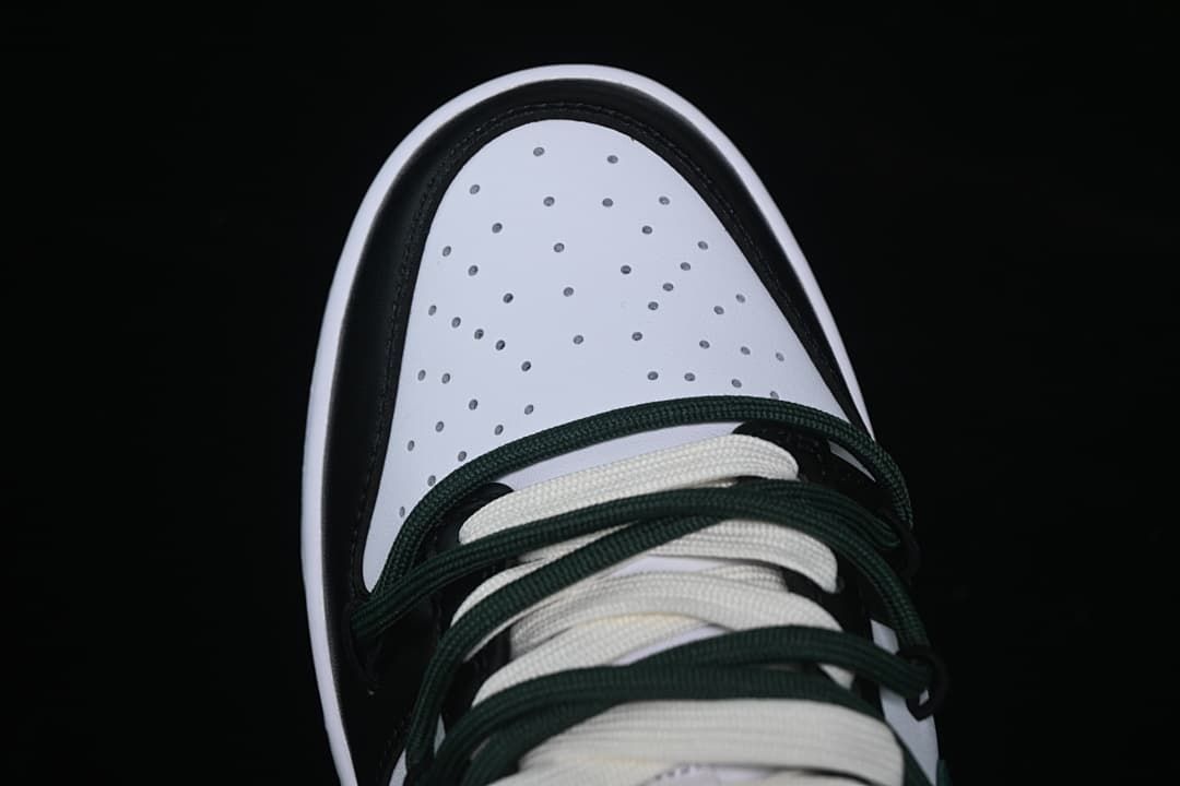 Top view of perforated toe and contrasting laces