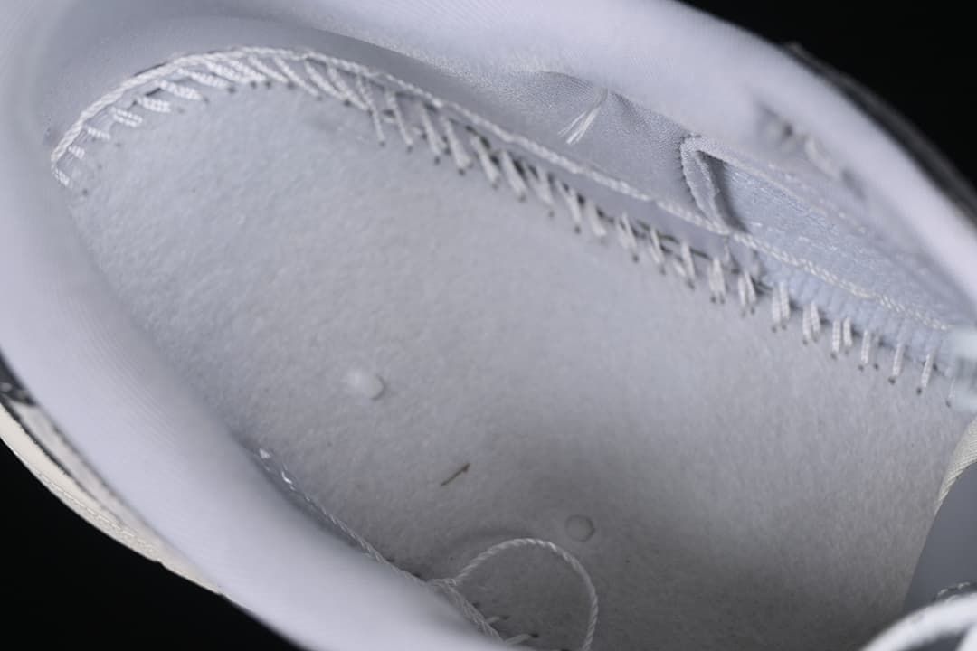 Close-up view inside the shoe showing interior stitching