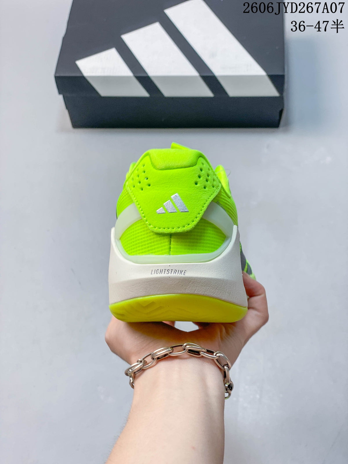 Rear view of the bright yellow shoe showing its structured heel.