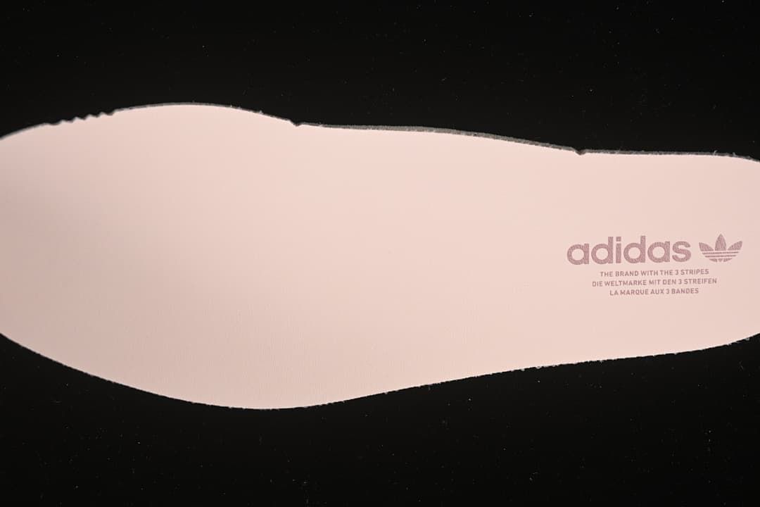 Pink insole with adidas Trefoil branding