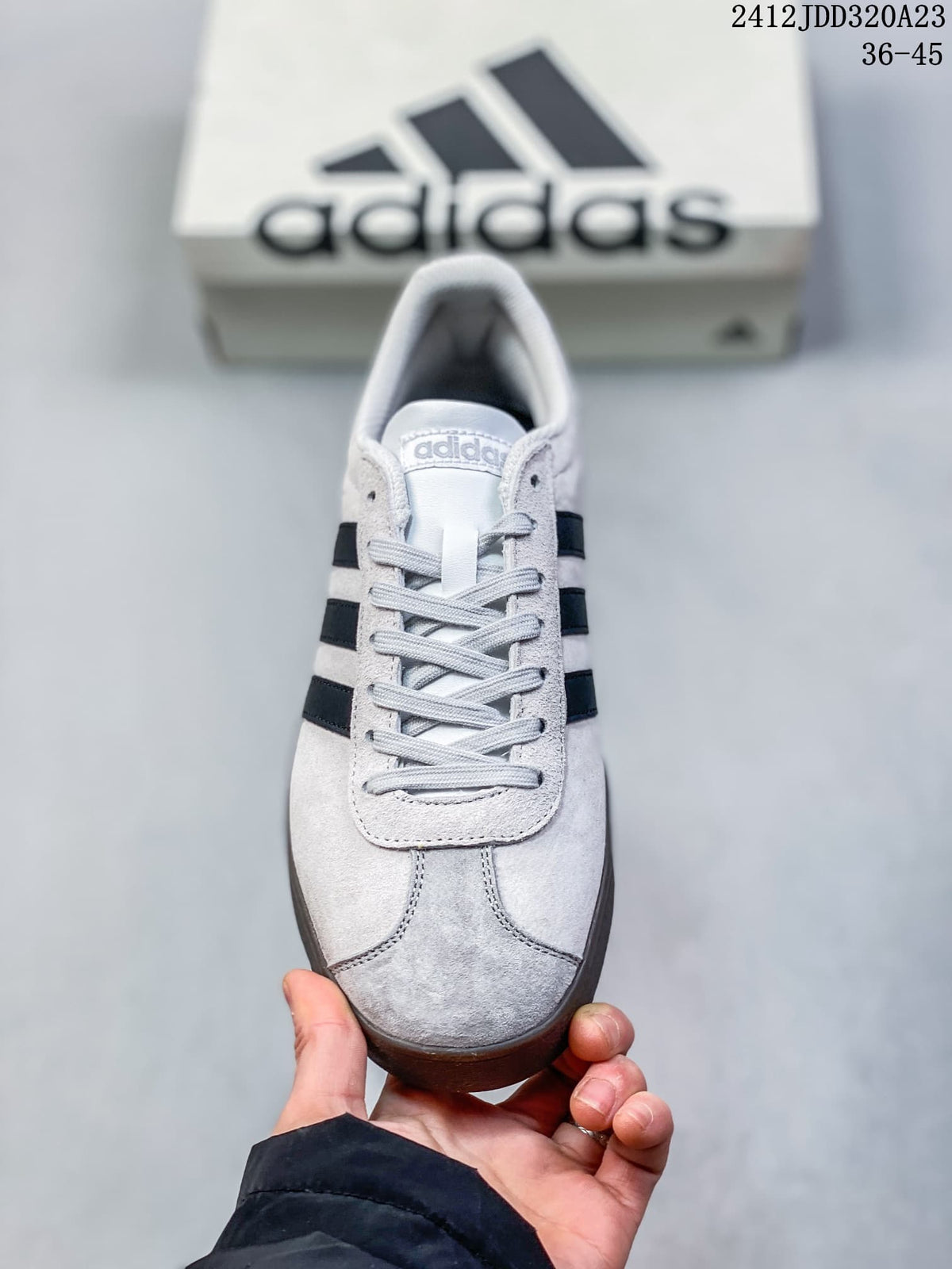 Front view showing the T-toe panel, laces, and black side stripes
