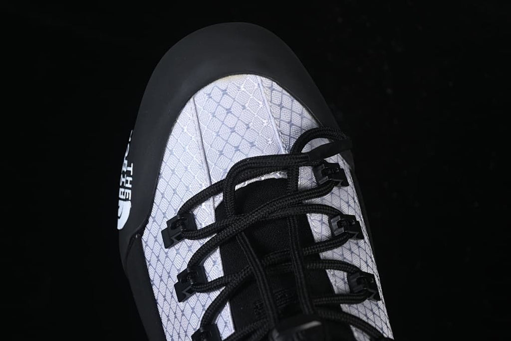 Top view of the shoe's toe and lacing.