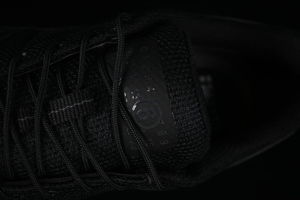 Close-up of the tongue with embossed numbered details