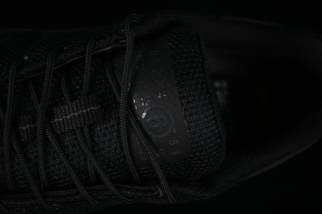 Close-up of the tongue with embossed numbered details