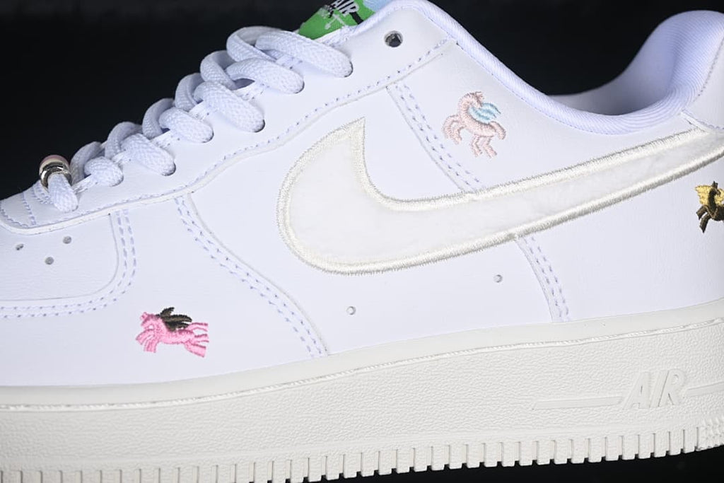 Close-up of the side Swoosh and colorful horse embroidery.