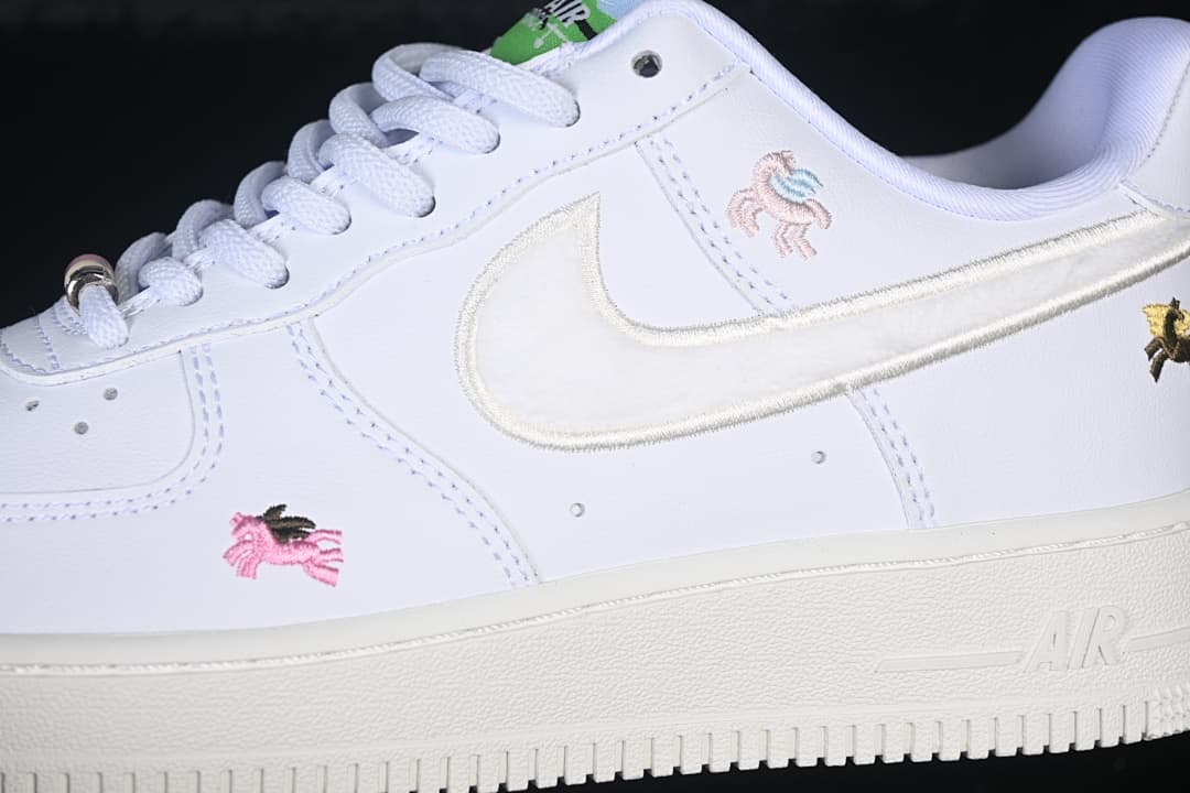 Close-up of the side Swoosh and colorful horse embroidery.