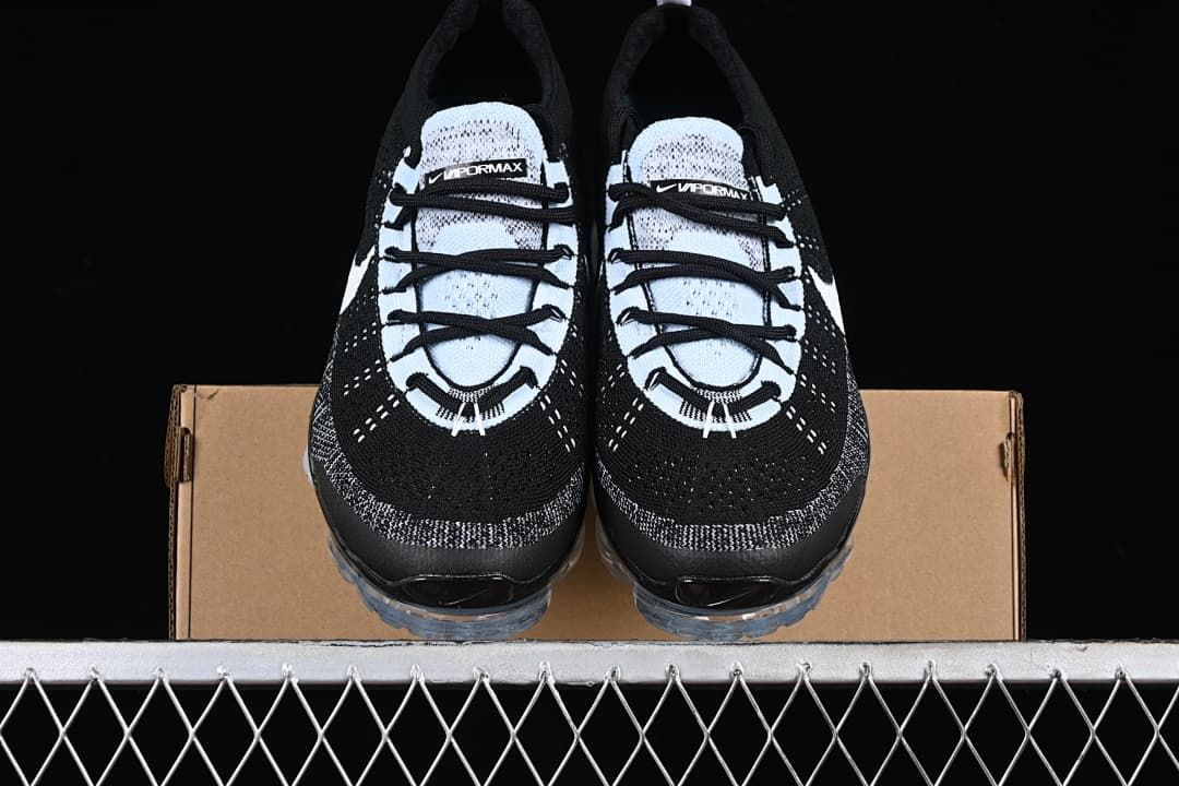 Front view of the pair resting on a shoe box.