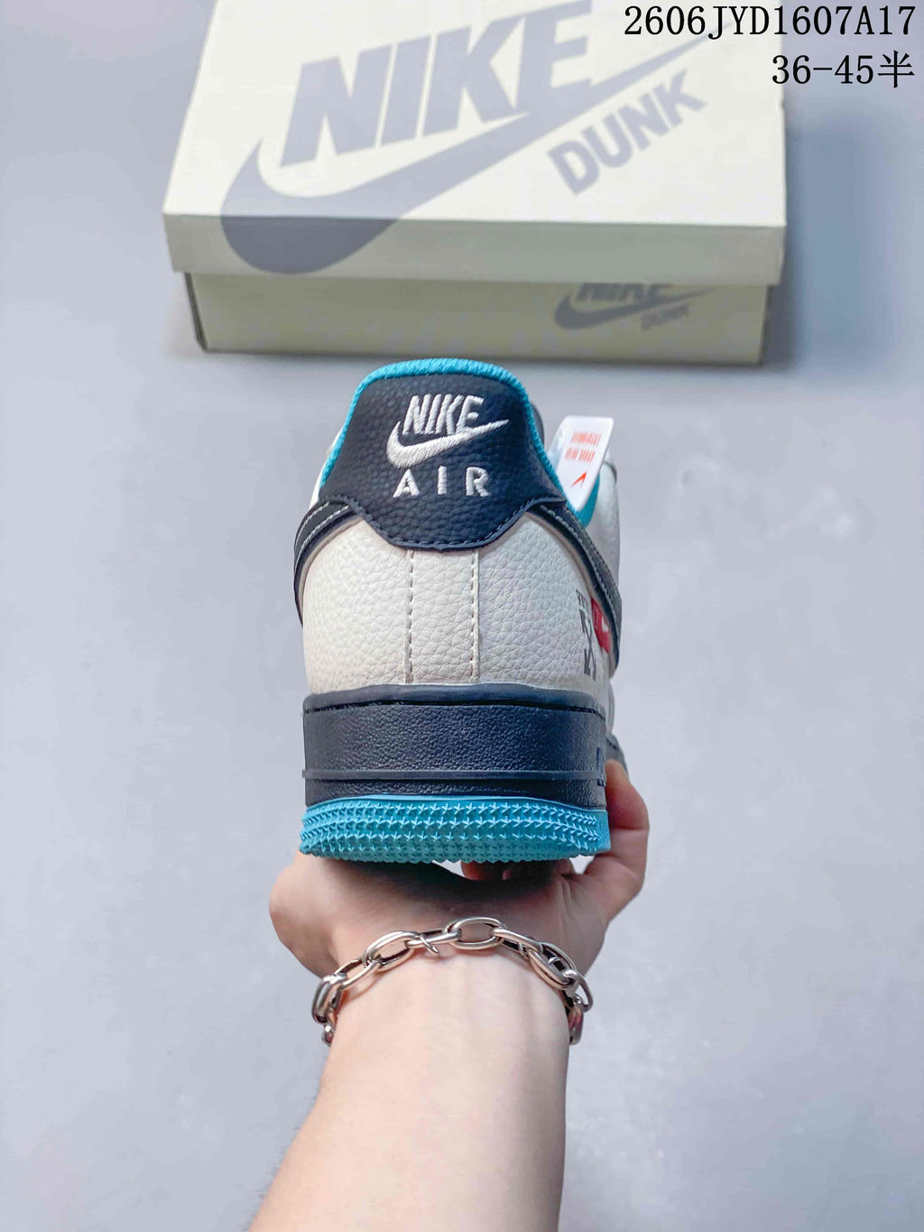 Rear view showing the heel panel and turquoise outsole