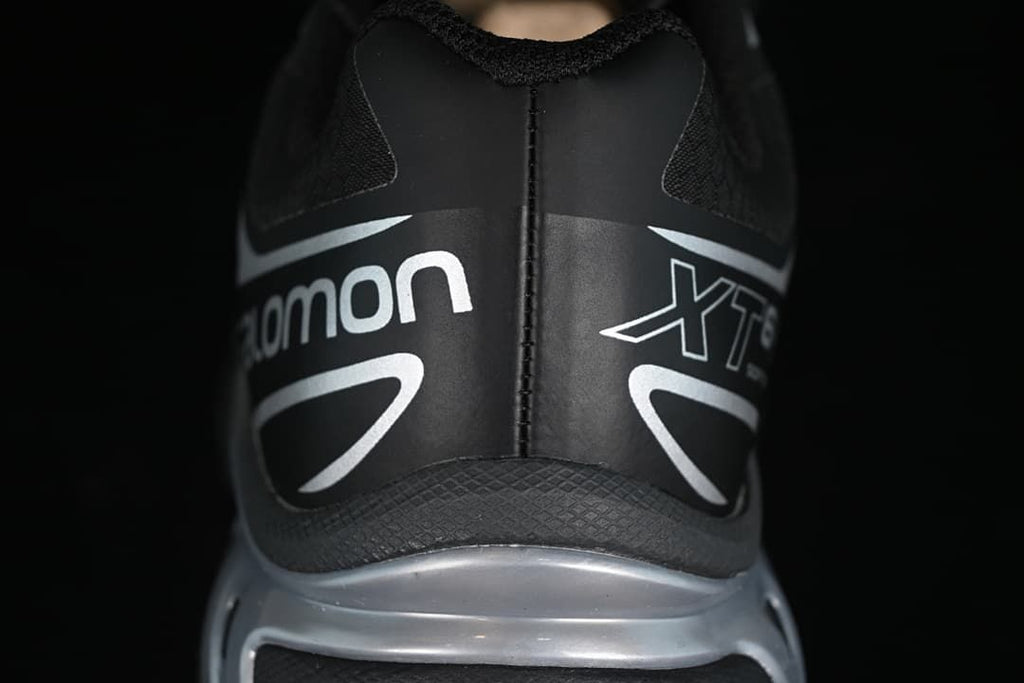 Rear view of the black and silver Salomon XT-6 GTX heel.