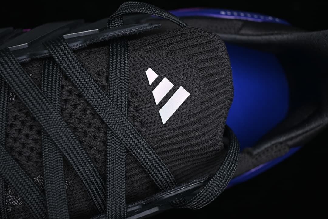 Close-up of the tongue branding and black laces
