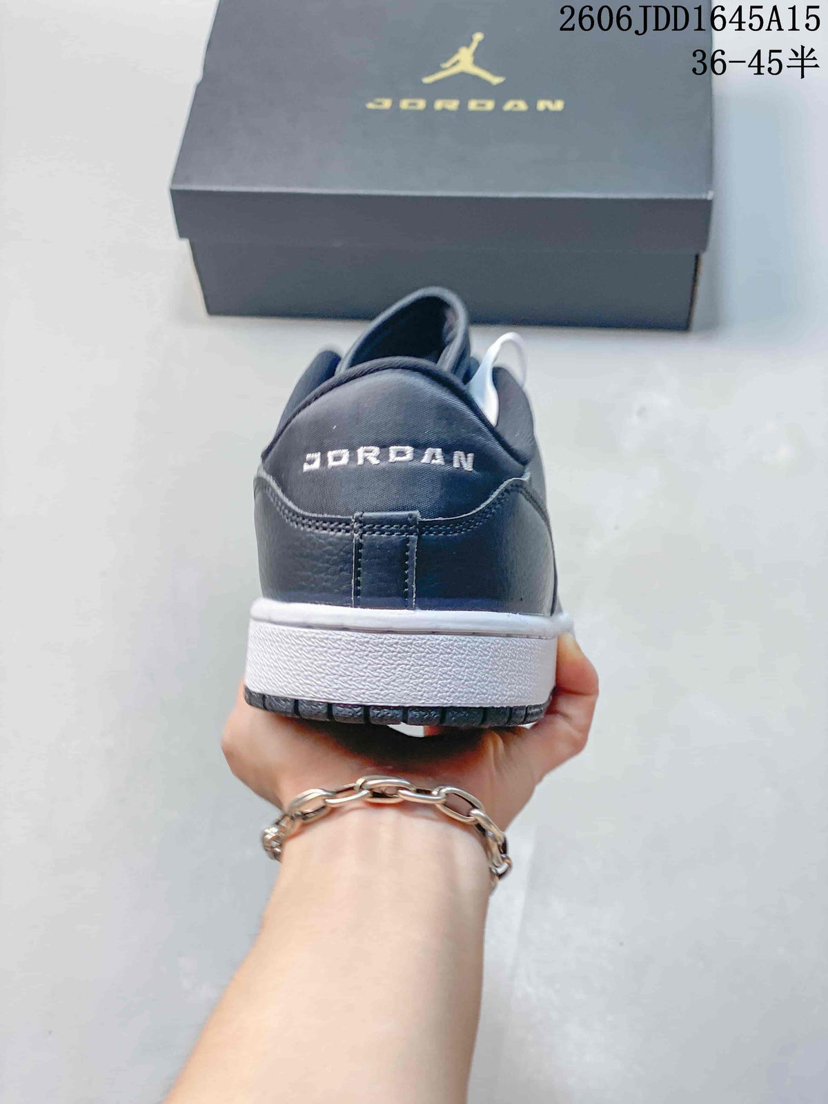 Rear view of a dark grey Jordan Court Connect sneaker