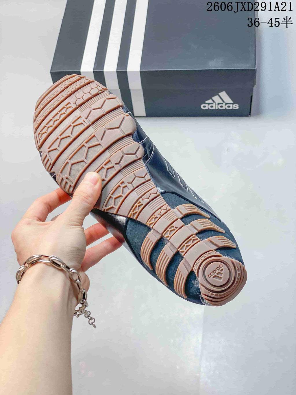 Close-up of the segmented gum-colored outsole on a Ghost Sprint sneaker