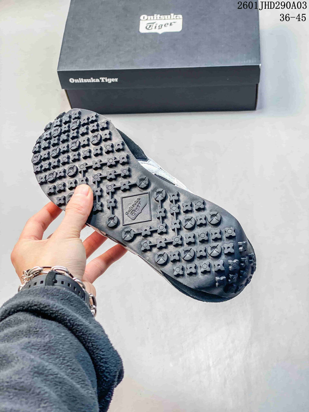Close view of the textured outsole on an Onitsuka Tiger sneaker