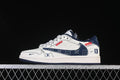 Side view of a white and navy low-top sneaker with denim-look Swoosh panels and graphic accents