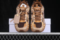 Top view of brown and cream Off-White sneakers with dark mesh, brown laces, layered panels and a hangtag.