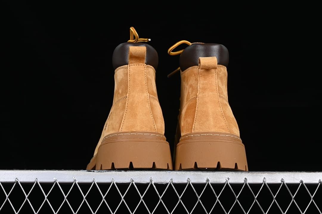 Rear view of both boots showing heel panels and pull loops