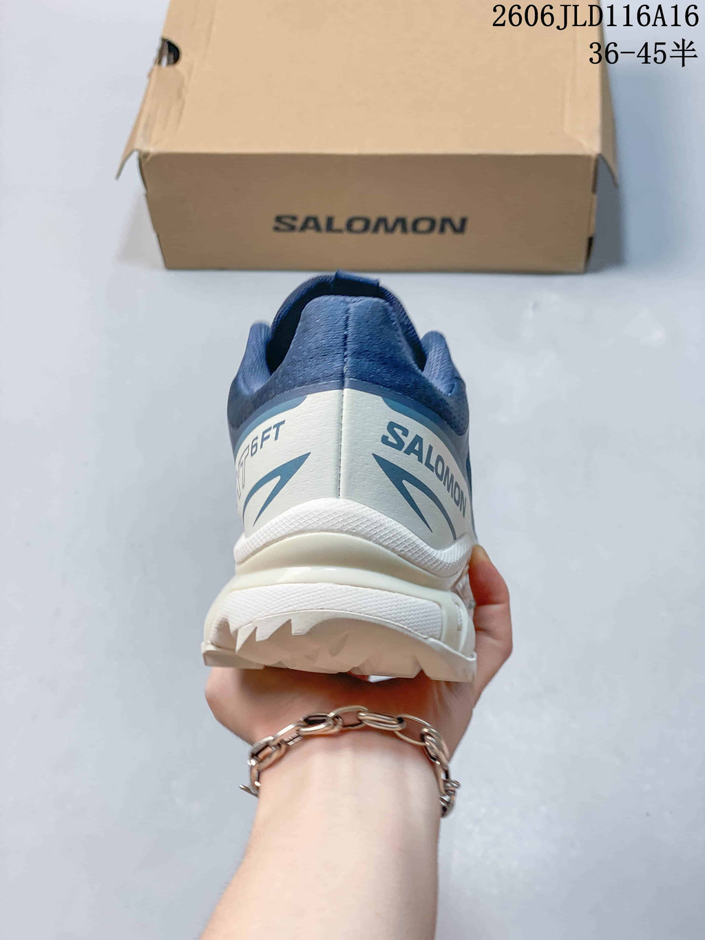 Rear view showing the heel design and Salomon branding