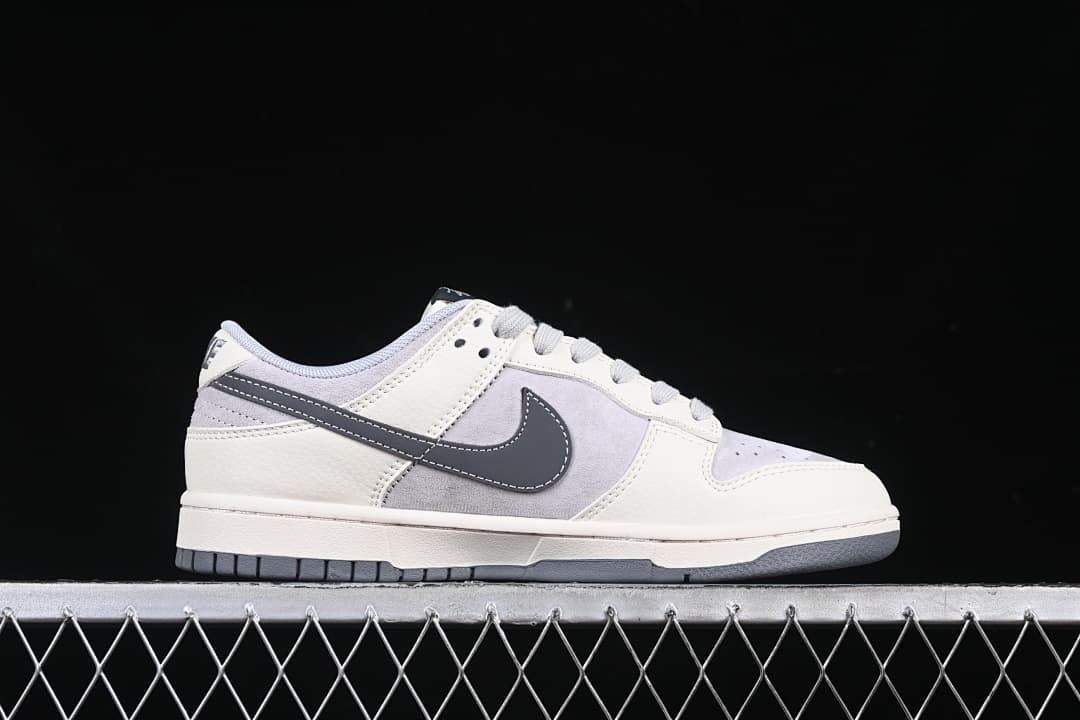 Outer side profile of a low-top sneaker with grey Swoosh