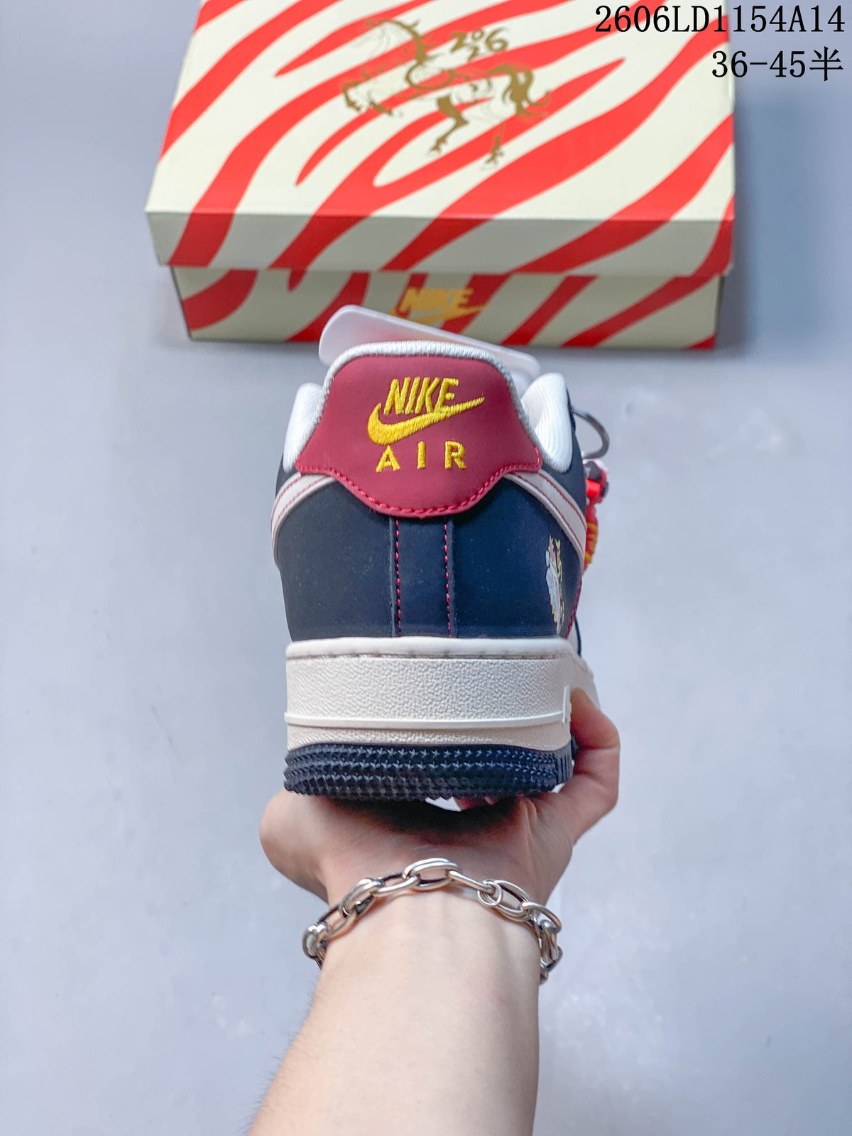 Rear view showing the navy heel, white midsole and red heel tab