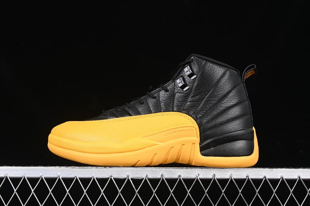 Side view of a black and gold Air Jordan 12 Retro sneaker