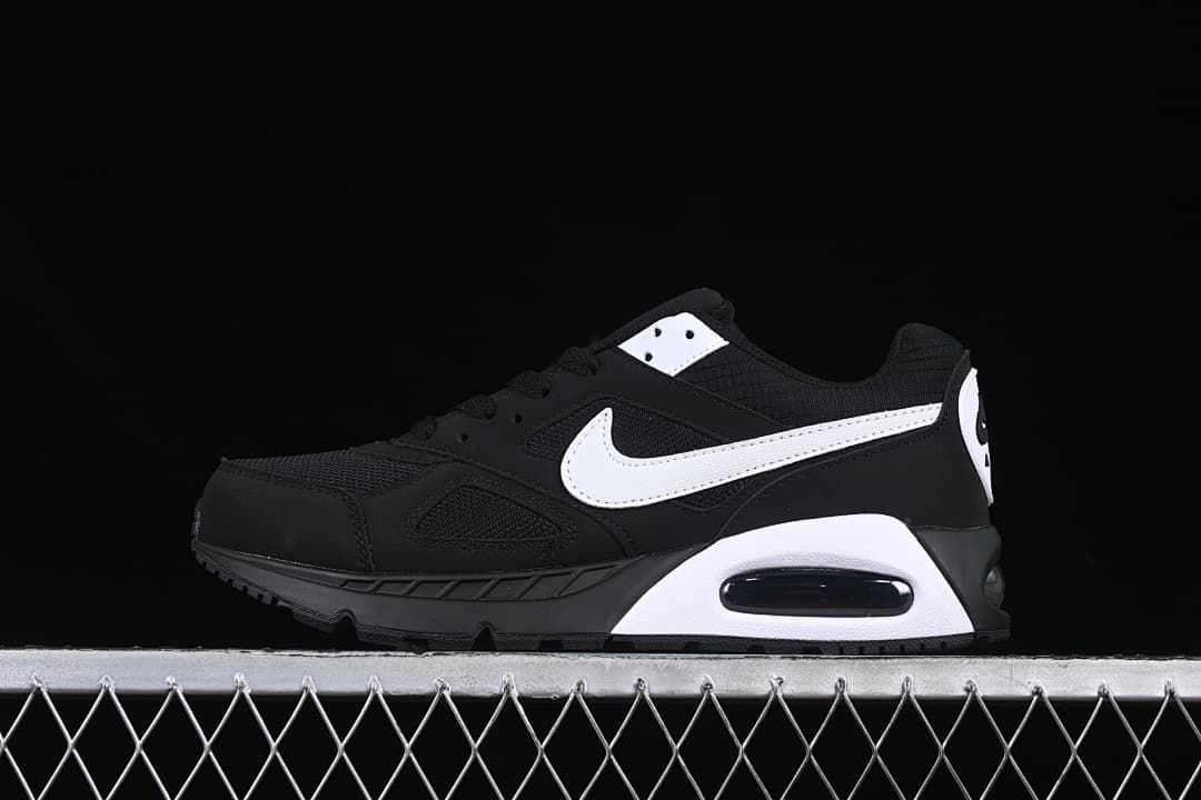 Side profile of a black and white Nike Air Max Correlate sneaker