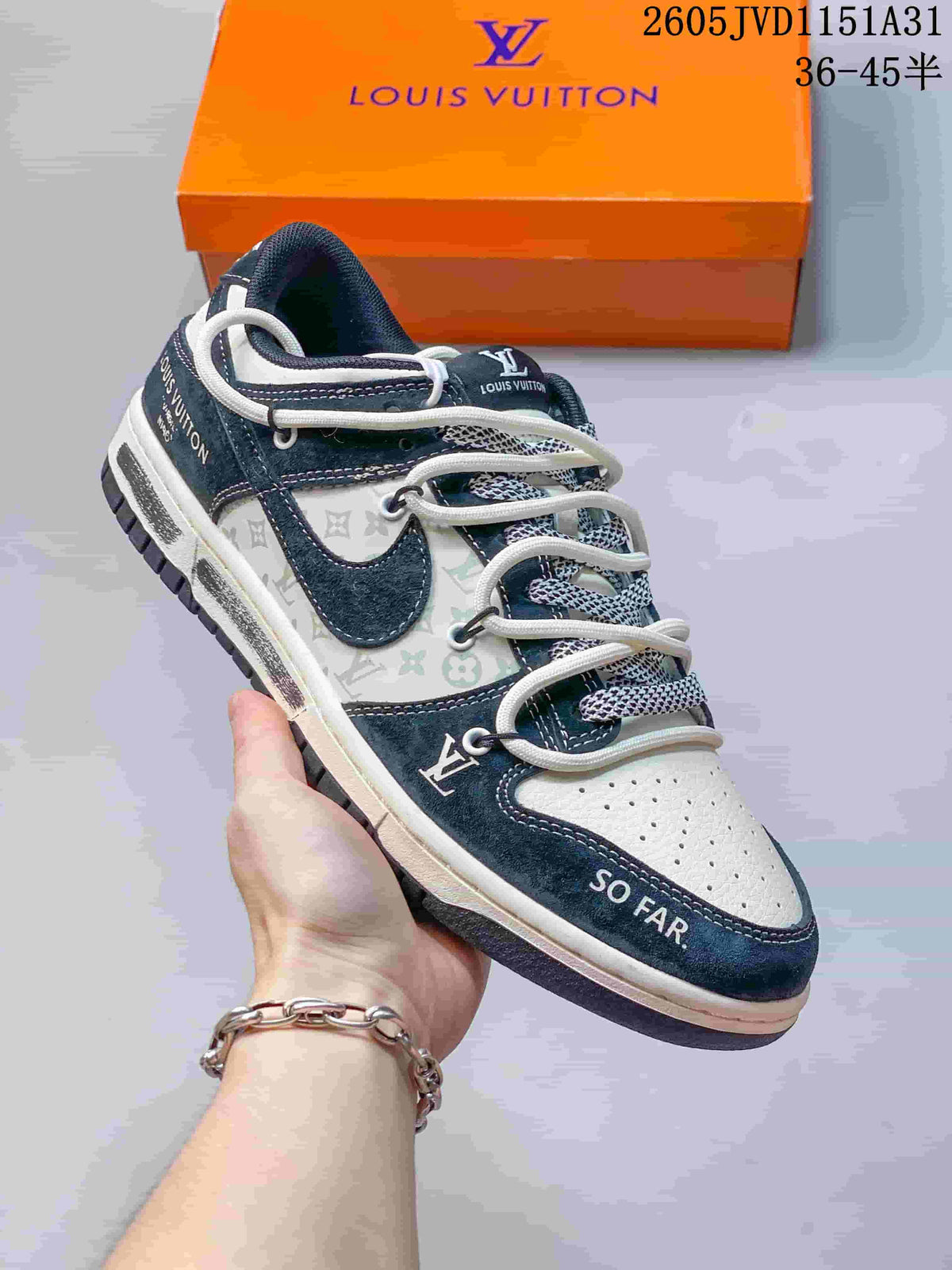 Angled view of a navy and white sneaker with patterned side panels and contrasting overlays.